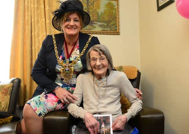 100th birthday of Rose Lycett of Sheffield. Rose celebrates with the Lord Mayor of Sheffield Clr Denise Fox. Picture Scott Merrylees