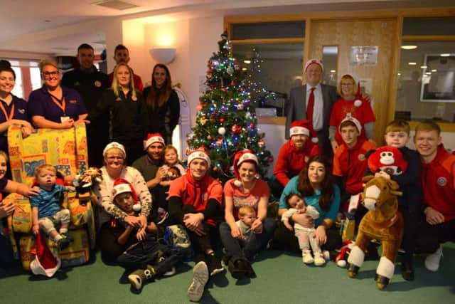 Sheffield United stars with patients, their families, staff and volunteers at Bluebell Wood Children's Hospice