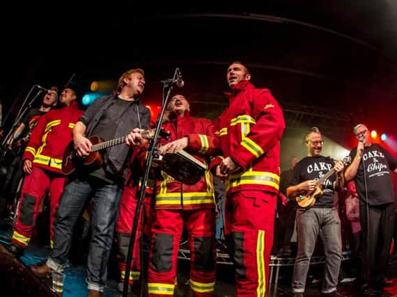 Firefighters on stage. Pic: Kevin Wells