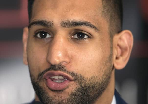 Eddie Hearn has confirmed that an agreement regarding a potential fight between Amir Khan and Kell Brook has a "long way to go"