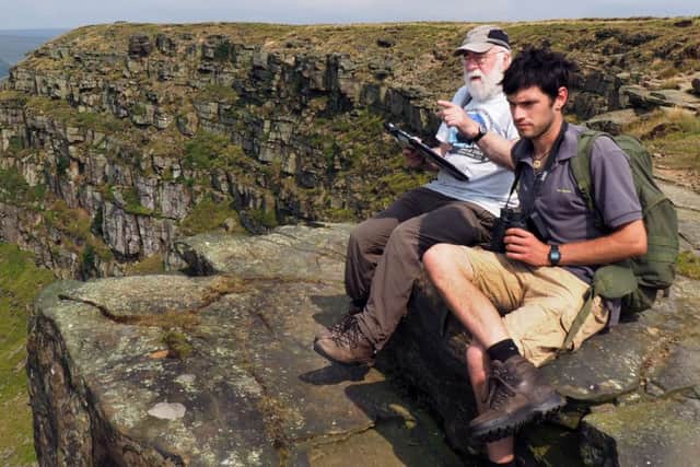 Chris Lockyer of the Thin Green Line charity (right) and retired ranger Gordon Miller birdwatching at Alport Castles