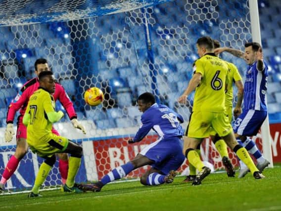 Lucas Joao is brought down by Richard Wood as Wednesday get a late penalty against Rotherham