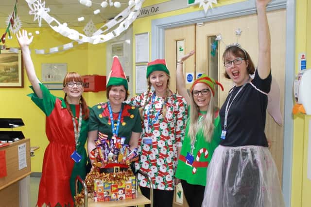 Cystic fibrosis elves taking part in activities at Sheffield Children's Hospital for National Elf Service Day