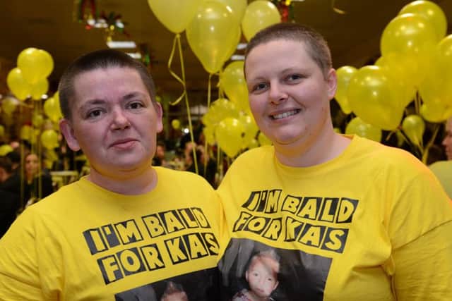 Event to remember Kasabian Newton-Smith at Wadsley WMC following his funeral Sam Barrass with family member Danielle Baines who shaved their heads to fundraise for the funeral costs