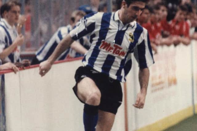 Cantona pictured playing for Wednesday in 1991.