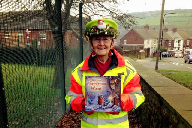 Crossing patrol warden at Stocksbridge Nursery Infant School is a big fan of Suzy's work