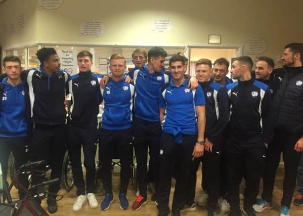 Chesterfield players including Liam O'Neil visiting Ashgate Hospicecare