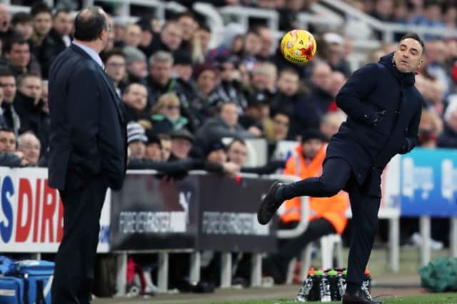 Sheffield Wednesday manager Carlos Carvalhal flicks the ball on from the touchline during the Sky Bet Championship match at St James' Park, Newcastle. PRESS ASSOCIATION Photo.