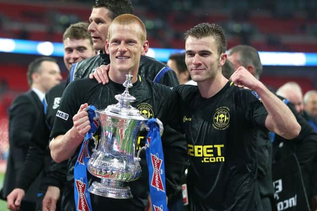 Callum McManaman (right) after winning the FA Cup with Wigan