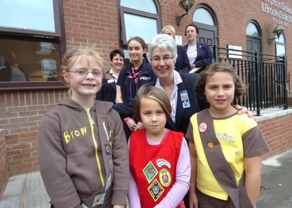 GIRLGUIDING SHEFFIELD  Chief Guide Liz Burnley(centre) with l/r: brownie Zoe Newbould, guide Lily Frascina, rainbow Ester Evans-Mudie and brownie Jasmine Evans-Mudie pictured outside the new Girlguiding Sheffield HQ.   19 September 2010