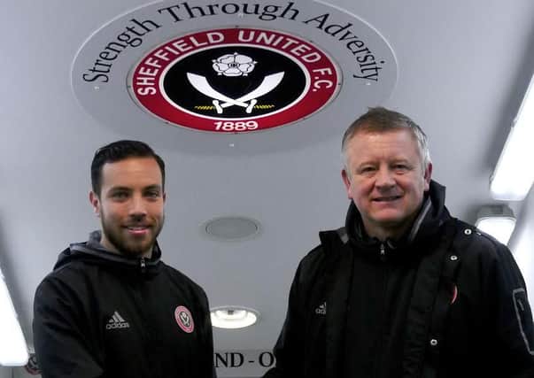 Samir Carruthers and Sheffield United manager Chris Wilder