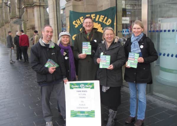 Natalie Bennett with Coun Douglas Johnson (left). Cllr Alison Teal (right) and more Green activists campaigning in Sheffield over rail fare rises.