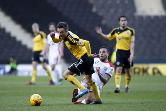 Samir Carruthers in action against Sheffield United : Blades Sports Photography