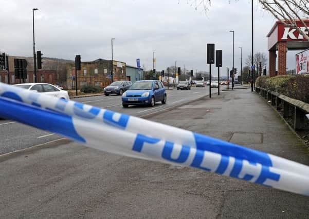 The scene at the junction of Penistone Road and Bradfield Road where a man died after being hit by a police car.