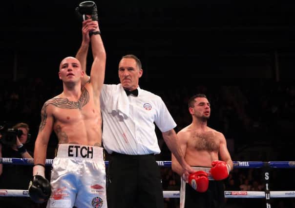 Adam Etches celebrates victory over Zoltan Sera in March - he's not boxed since.