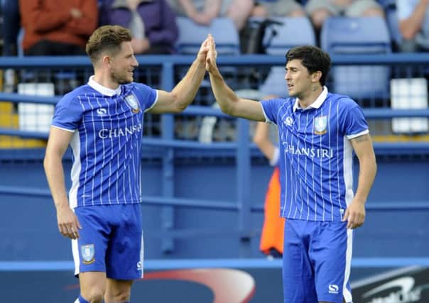 Sam Hutchinson and Fernando Forestieri have both signed new contracts
