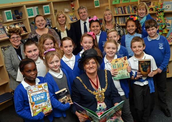 Lord Mayor of Sheffield, councillor Denise Fox, pictured with members of the school council, staff members, governors and friends of the late George MCdonald, in the schools newly dedicated George McDonald library at Charnock Hall primary school. Picture: Marie Caley NSST Charnock Library MC 2