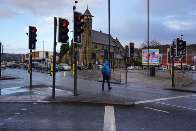 The pedestrian crossing at the junction of Penistone Road and Owlerton Green, Hillsborough. People have complained that the signals are confusing, and one person has put up a sign to try to clarify them. A man died after being hit by a police car nearby - although there is no suggestion that the signals were to blame.