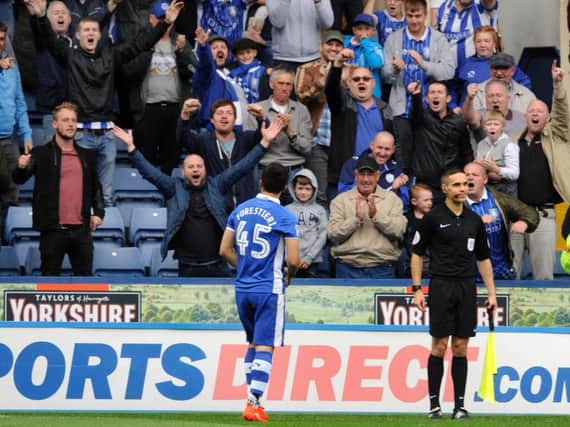 Fernando Forestieri takes the adulation from fans after scoring against Wigan earlier this season