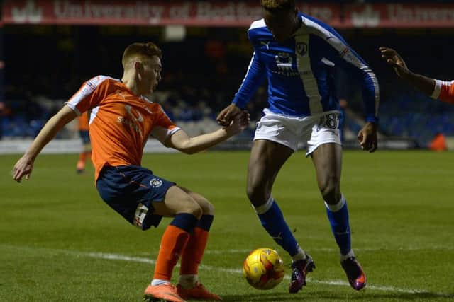 Chesterfield's Gboly Ariyibi battles with Luton's Jack Senior. Pic: Andrew Roe
