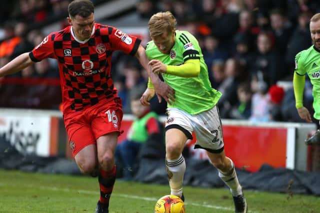 Mark Duffy of Sheffield Utd and Matt Preston of Walsall during the English League One match at Bank's Stadium, Walsall. Picture date: January 14th, 2017. Pic Simon Bellis/Sportimage