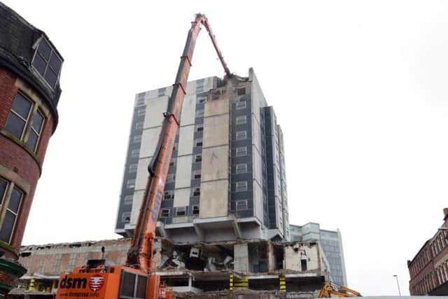 Demolition of the main tower of the Grosvenor House Hotel begins.