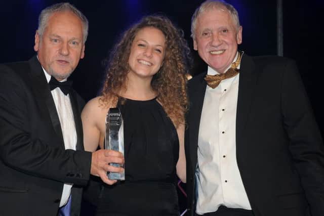 Hannah Duraid, of The Great Escape Game is awarded with the Young Business Person of the Year Award from Learning Unlimited and Harry Gration at the Sheffield Business Awards 2016.