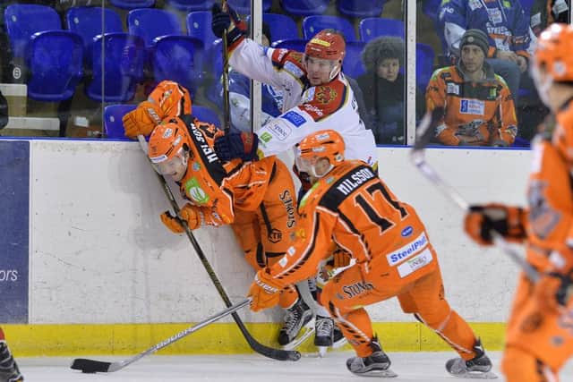 Markus Nilsson steals the puck against Edinburgh Capitals, on Wednesday. Pic Dean Woolley
