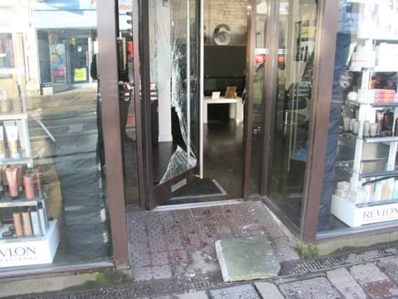 The damage at S6 Hairdressing on Middlewood Road after thieves smashed their way in using a paving slab. Picture: George Torr/The Star