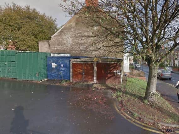 Some of the garages due to come down in Club Garden Road. Photo: Google