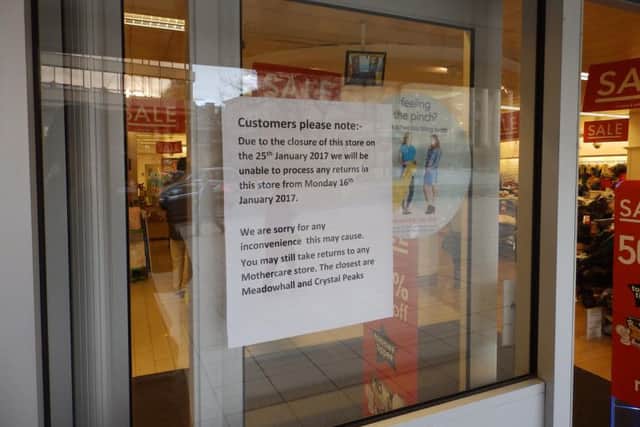 A sign on the doors of Mothercare's Sheffield store informs customers of its impending closure