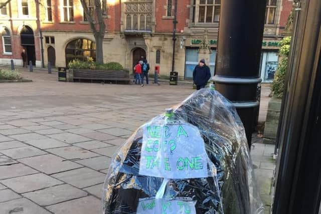 The coat rack was placed behind the tram stop outside Sheffield Cathedral