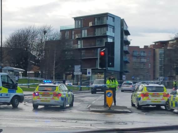 Police have cordoned off Boston Road, at the junction with London Road, following the collision