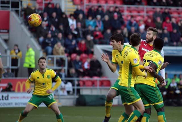 Kirk Broadfoot heads for goal