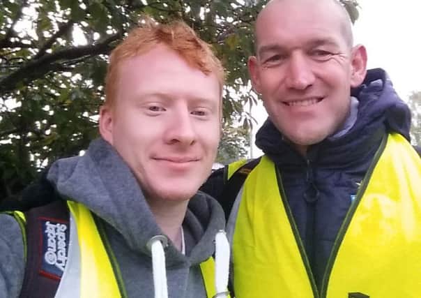 Daniel Peacock walks 23 miles with retired Huddersfield Town FC footballer Andy Booth. Daniel was told he may never walk when he was treated for inverted feet at Sheffield Children's Hospital as a child.