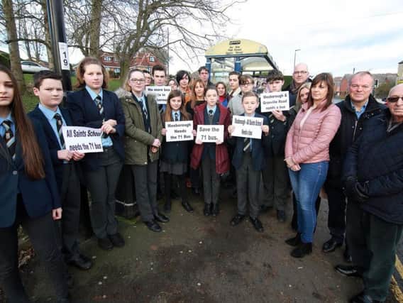 Pupils and parents protest against changes to the 71 bus in Mosborough.