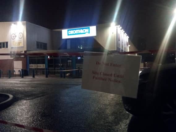 A notice outside the entrance to Decathlon in Sheffield on Monday night