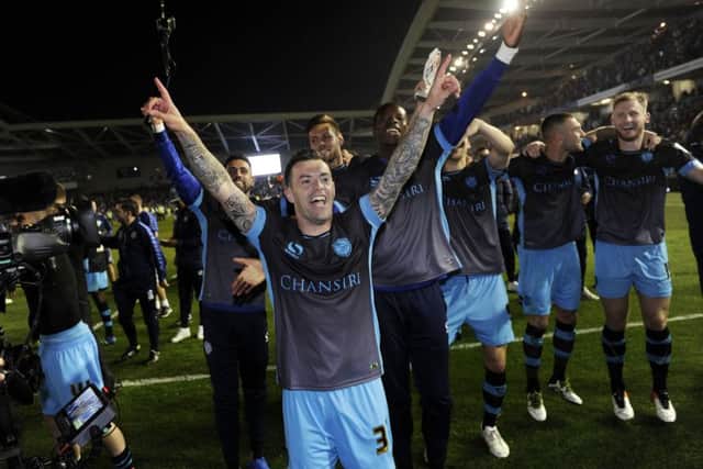Party time on the pitch at the Amex where Sheffield Wednesday secured a Play-Off Final place