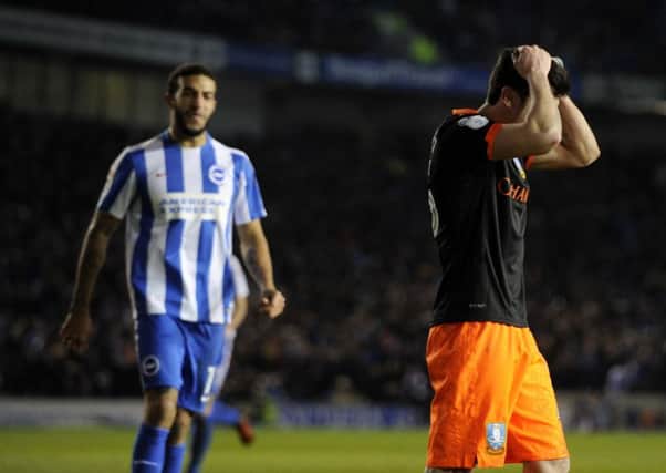 Fernando Forestieri puts his head in hands after missing a penalty and a chance to put Wednesday in front. Picture: Steve Ellis
