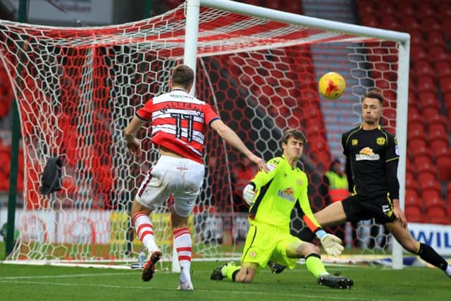 Rovers player Andy Williams goes close with a shot on goal. Picture: Chris Etchells