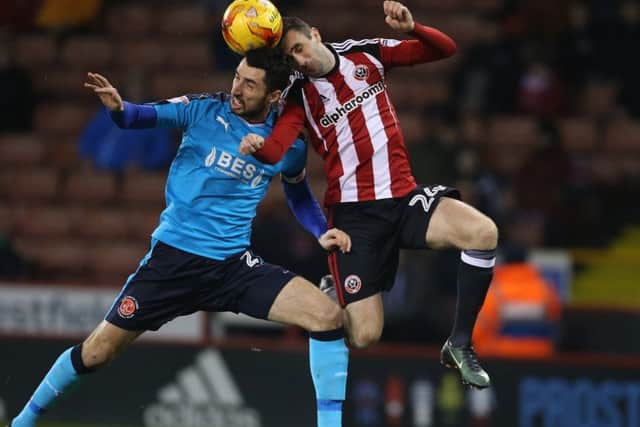 Conor McLaughlin of Fleetwood Town  in action with Danny Lafferty of Sheffield Utd Pic: Simon Bellis/Sportimage