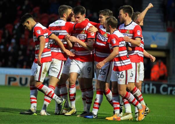 Rovers celebrate re-taking the lead through John Marquis.