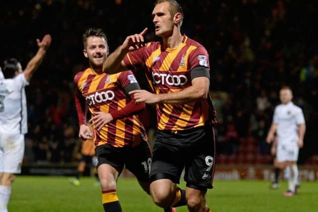 James Hanson celebrates scoring for Bradford City, alongside soon-to-be team mate again Marc McNulty