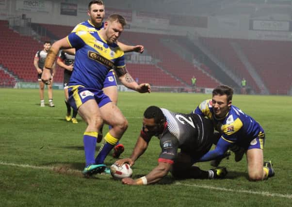 Garry Lo touches down one of a try double against the Dons for the Eagles. Picture: Simon Hall