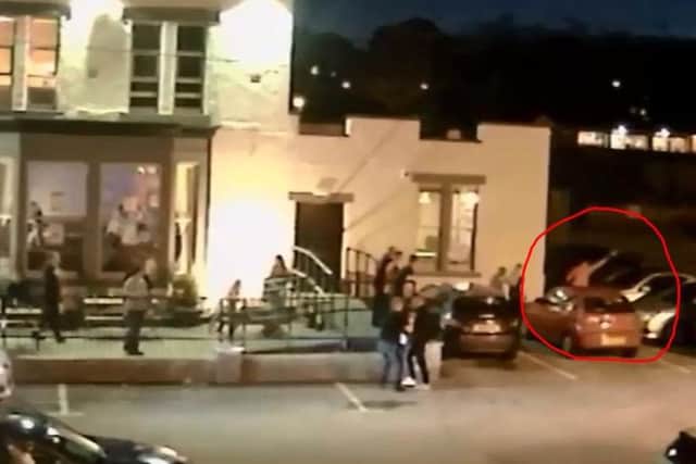 Jamie Howden (circled) opens fire in the Thorncliffe Arms pub car park