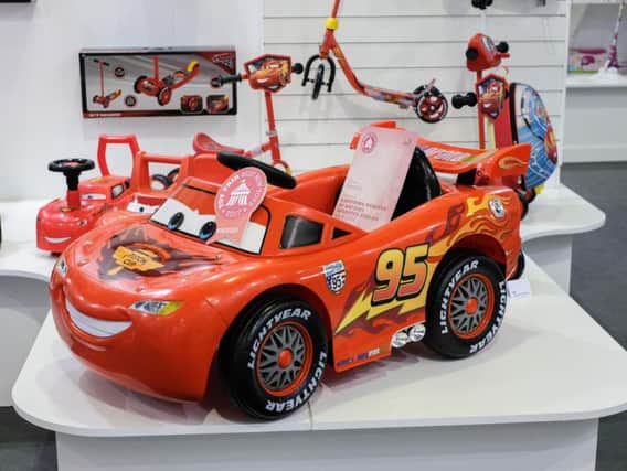A ride-on replica of Cars' Lightning McQueen has been tipped as one of 2017's top toys - despite costing a whopping 200.