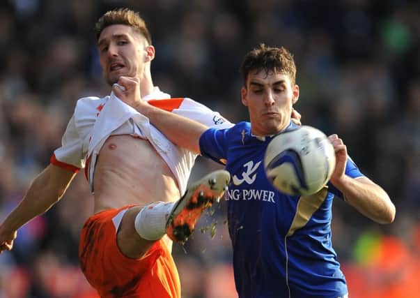 Leicester City's Matty James (right) and Blackpool's Chris Basham.