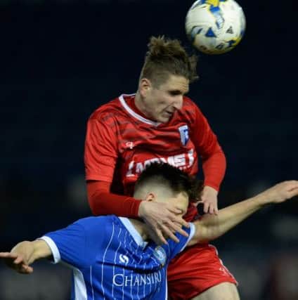 Ryan Huckle beats George Hirst to a high ball.
Sheffield Wednesday U18 v Gillingham U18.  FA Youth Trophy Fourth Round.  6 January 2017.  Picture Bruce Rollinson