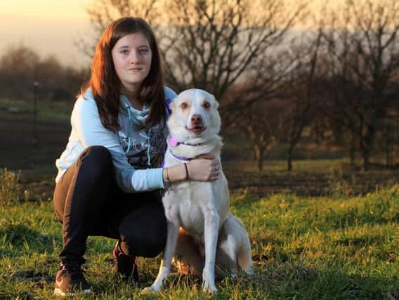 Shannon Mills with one of her dogs.