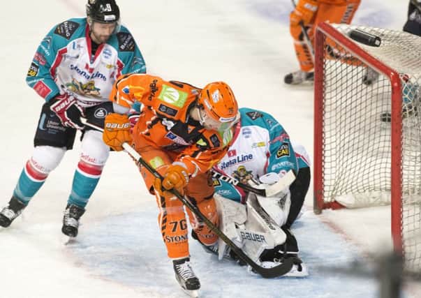 Sheffield Steelers v Belfast Giants Levi Nelson sees a shot saved at close range by the Giants keeper. Pic Dean Atkins